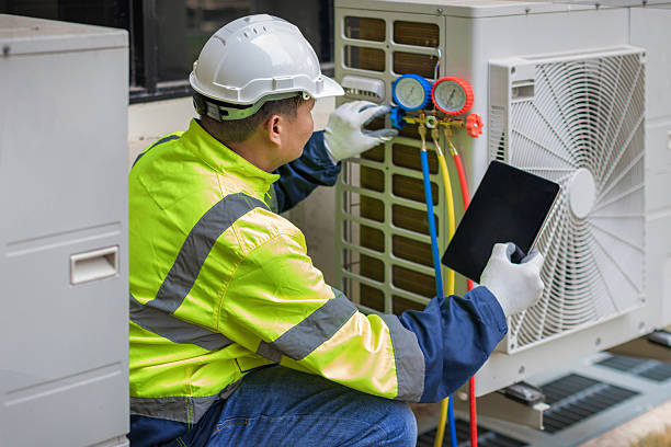 Professional Air Conditioning Repair technician working in River Falls, WI